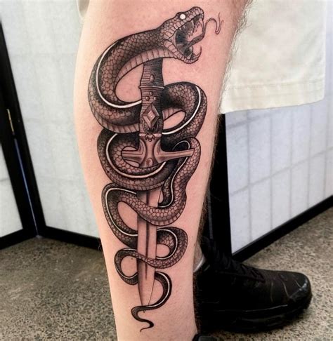 snake leg tatoo